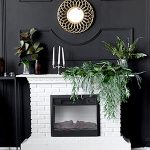 Redesign services for your home with black walls and white washed painted fireplace